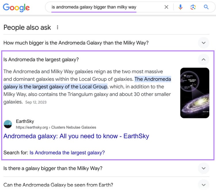 Google SERP for "is andromeda galaxy bigger than milky way" showing the "People also ask" box, with one question expanded.