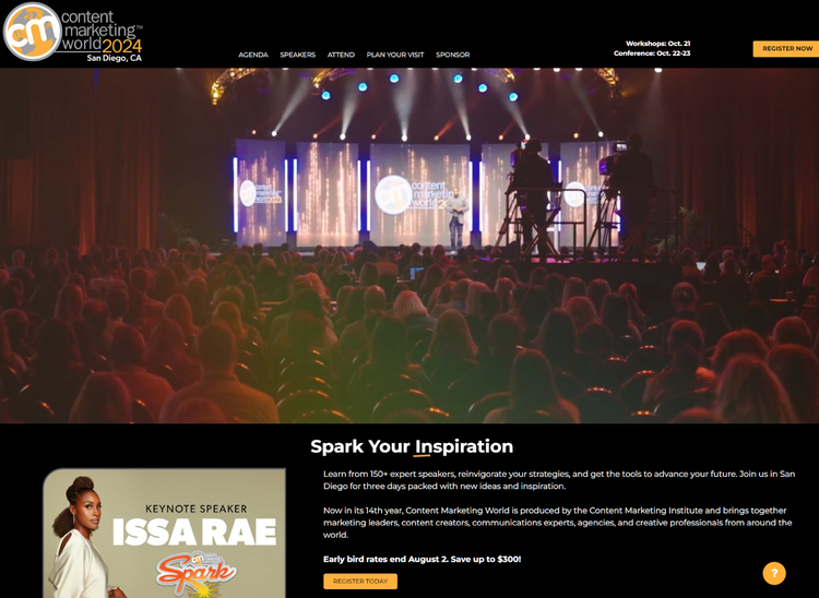 Content Marketing World 2024 conference stage with large screens and audience with colorful lighting