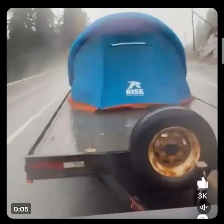 Rise Tents video ad testing tent durability on trailer during heavy rain