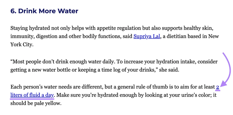 Section of article on drinking more water with arrow pointing to linked resource in content.