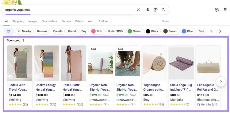 Google SERP with "organic yoga mat" entered as the term and the sponsored results on top of the page highlighted.