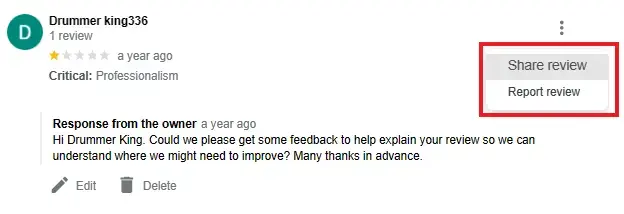 A Google review and the menu to report it.
