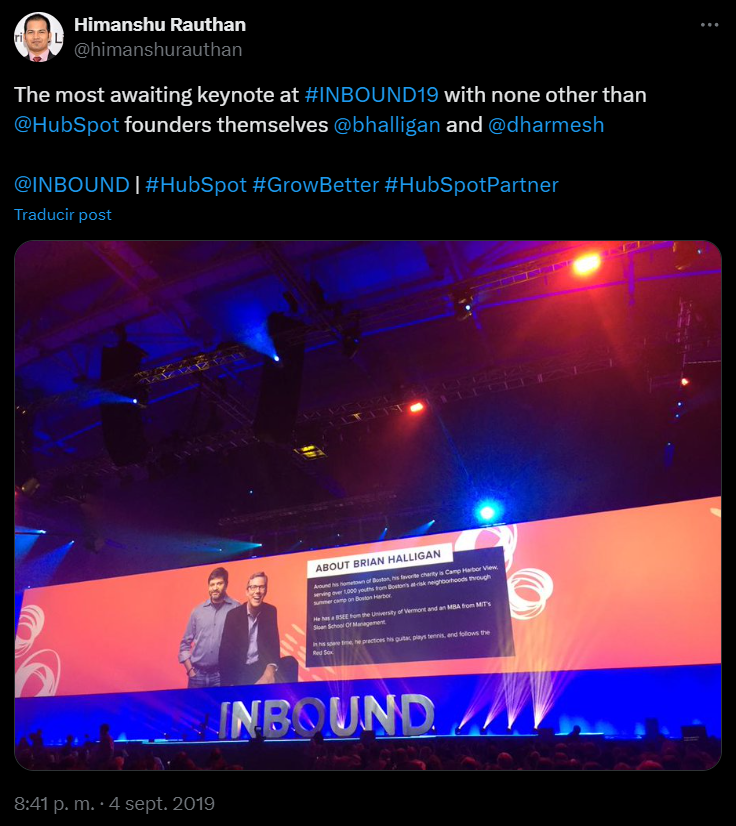INBOUND conference stage with large screen showing speaker bio for Brian Halligan presentation