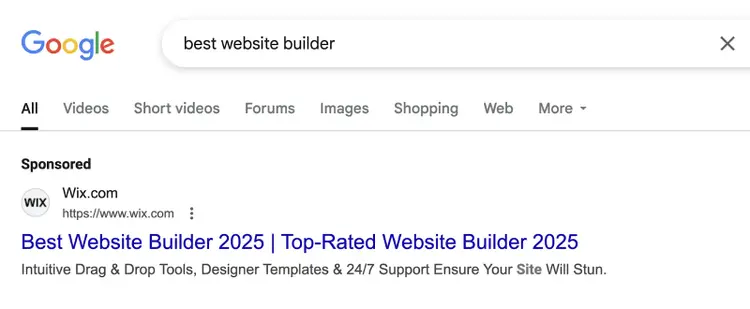 PPC ad with sponsored label appears at the top of results.