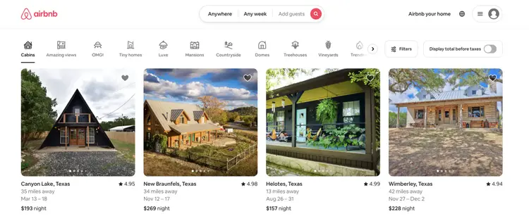 Airbnb property listings showing cabin and house rentals with pricing