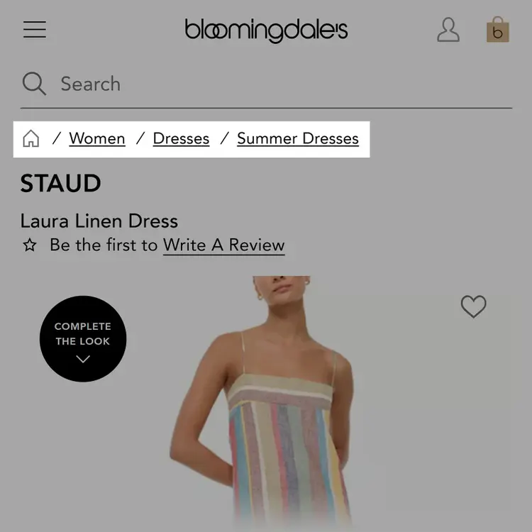 Bloomingdale’s mobile page with breadcrumb trail showing Women > Dresses > Summer Dresses above a product listing.