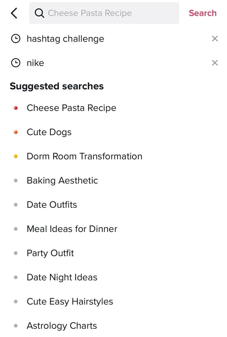 TikTok search interface showing trending topics and searches