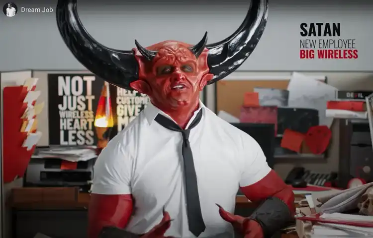 Mint Mobile mockumentary video ad with Satan character as corporate employee