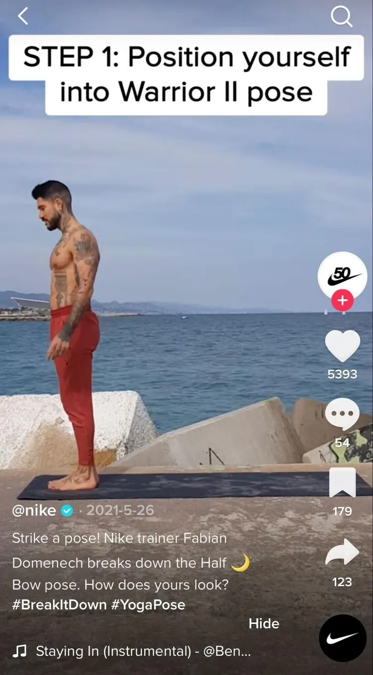 TikTok Nike yoga tutorial Step 1 showing Warrior II pose