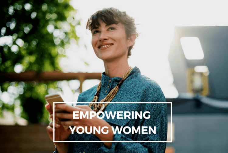 Women attending professional networking event seated in modern office space